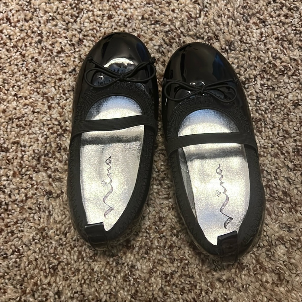 Black leather slippers